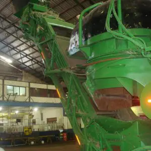 Exterior view of a sugar harvester showing primary extractor hood Exterior view of a sugar harvester showing primary extractor hood
