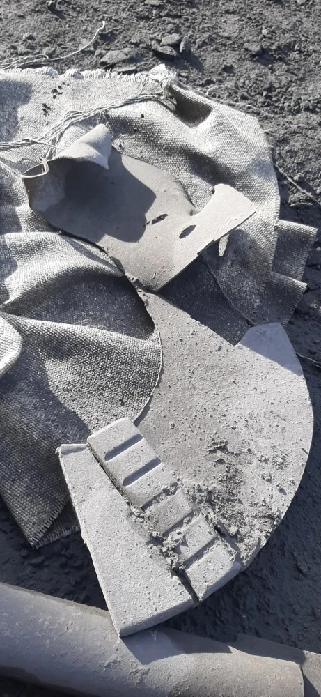 Example of torn and deformed base plate