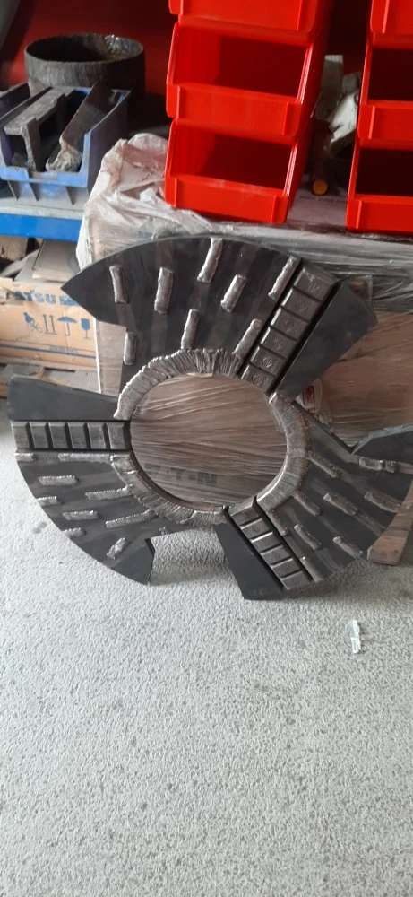 Original Barmac Rotor with weld deposits on the surface